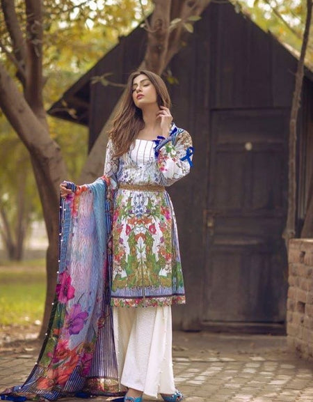 Noor By Sadia Asad Luxury Lawn Collection’ blooming petals