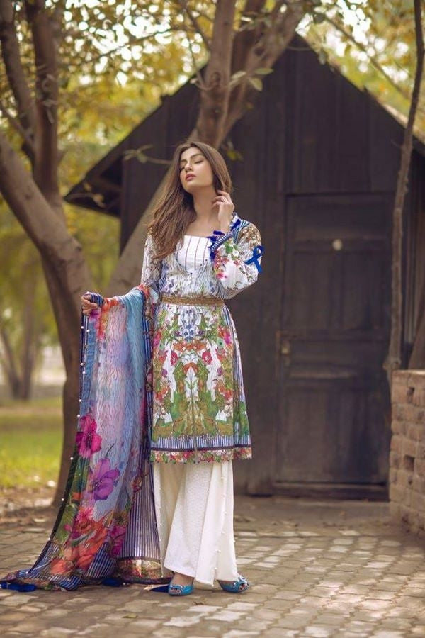 Noor By Sadia Asad Luxury Lawn Collection’ blooming petals